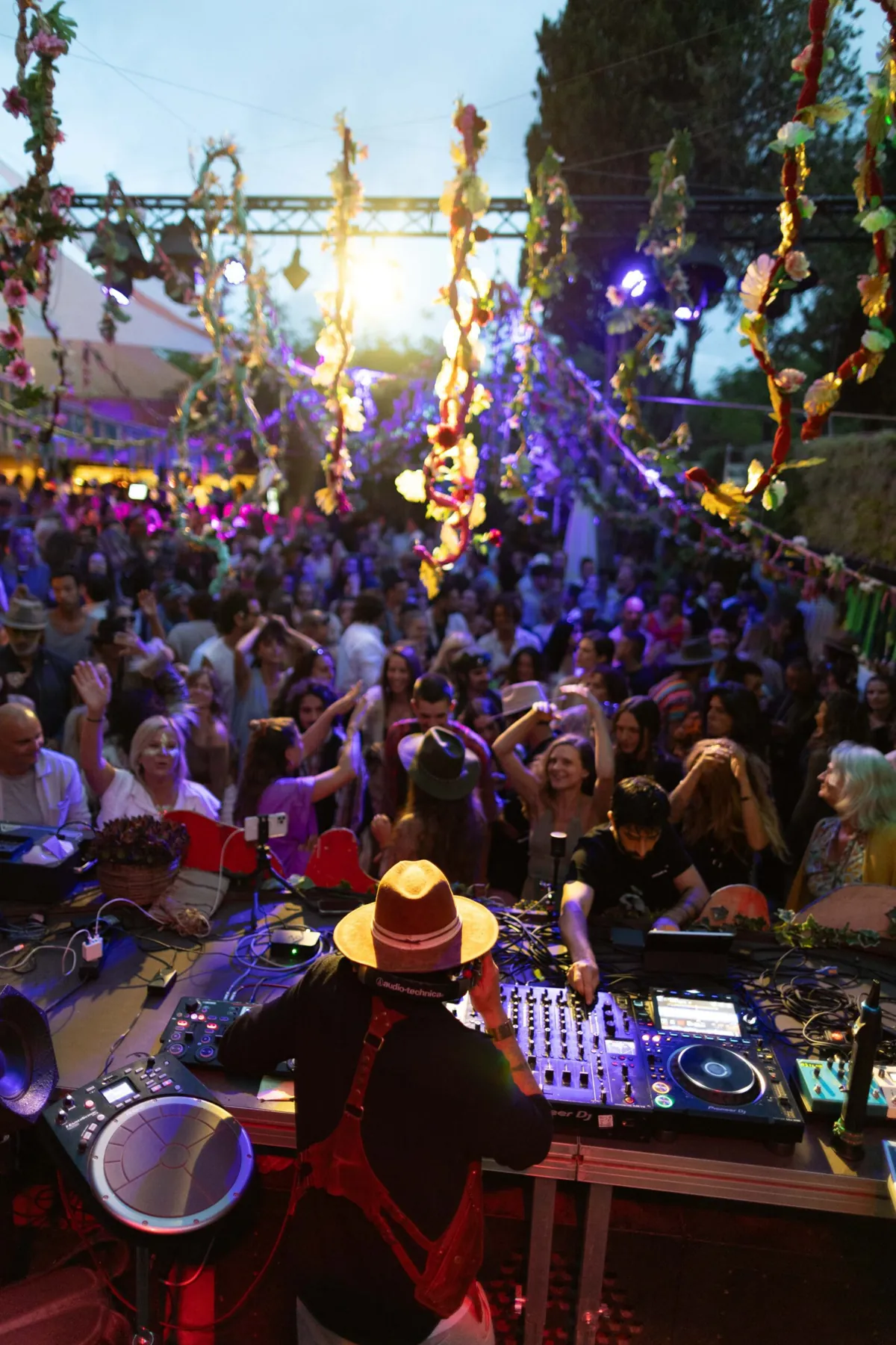 Jasileo behind the decks facing a full night dancefloor