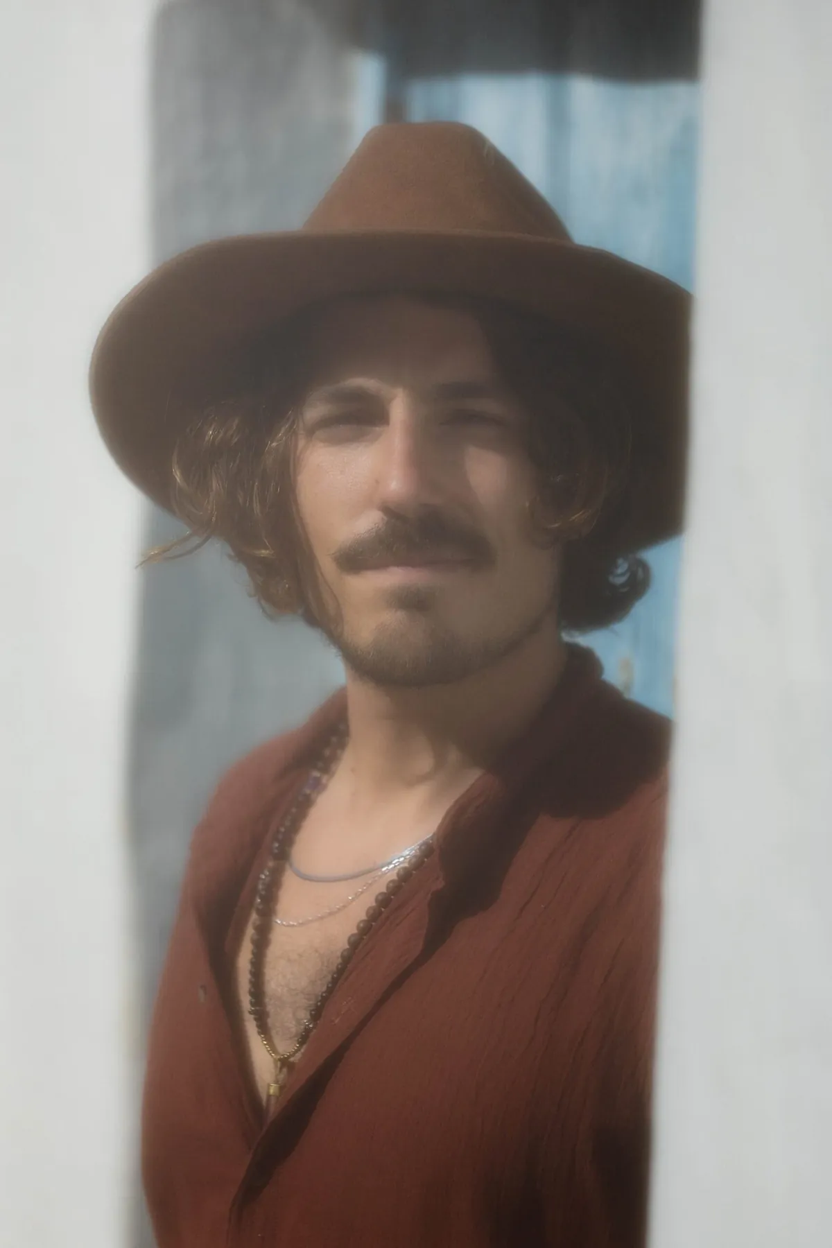 Portrait of Jasileo in a hat, in soft light
